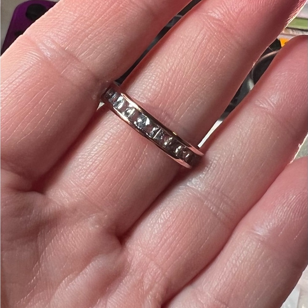 Size 10. Lab created blue topaz on rose gold plating. SRP $116